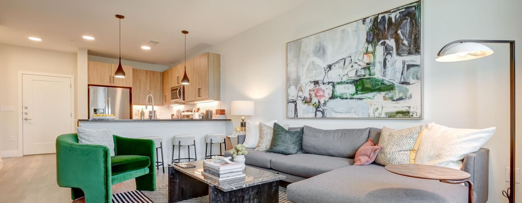 a living room with a couch and a table