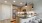 a kitchen with a marble counter top