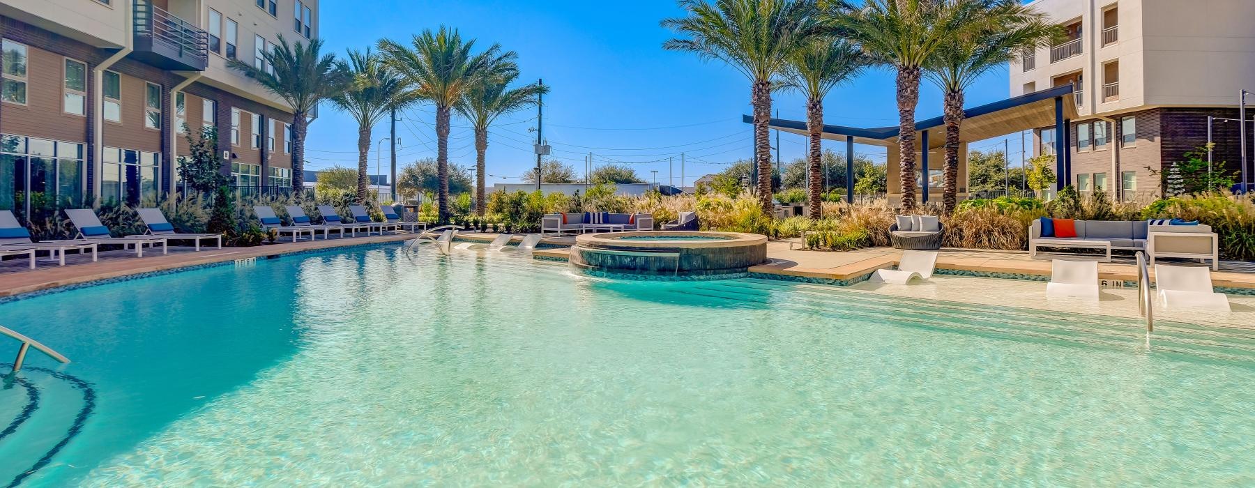 a pool with a building in the background